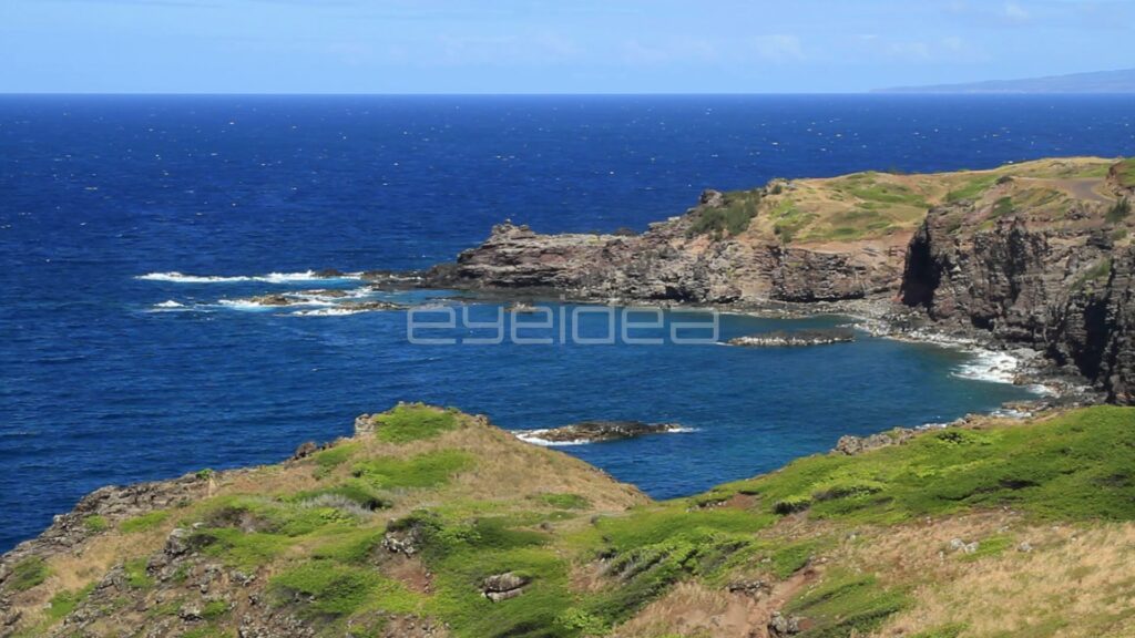 High View of Rugged Maui North Shore Cove and Blue Sea