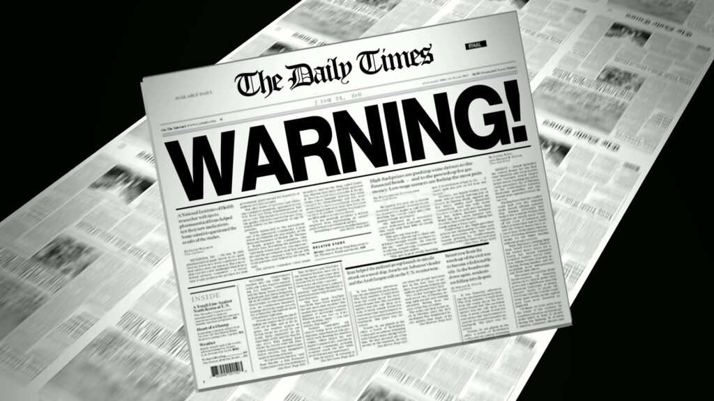 Spinning Newspaper with WARNING! Headline