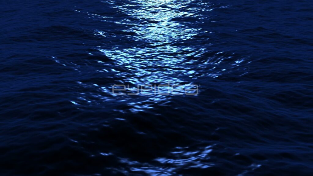 Moonlight Reflecting on Dark Blue Ocean Waves