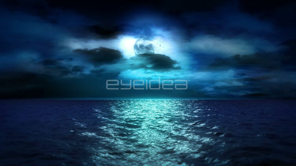 Full Moon Peeking Through Clouds Over a Teal Night Sea