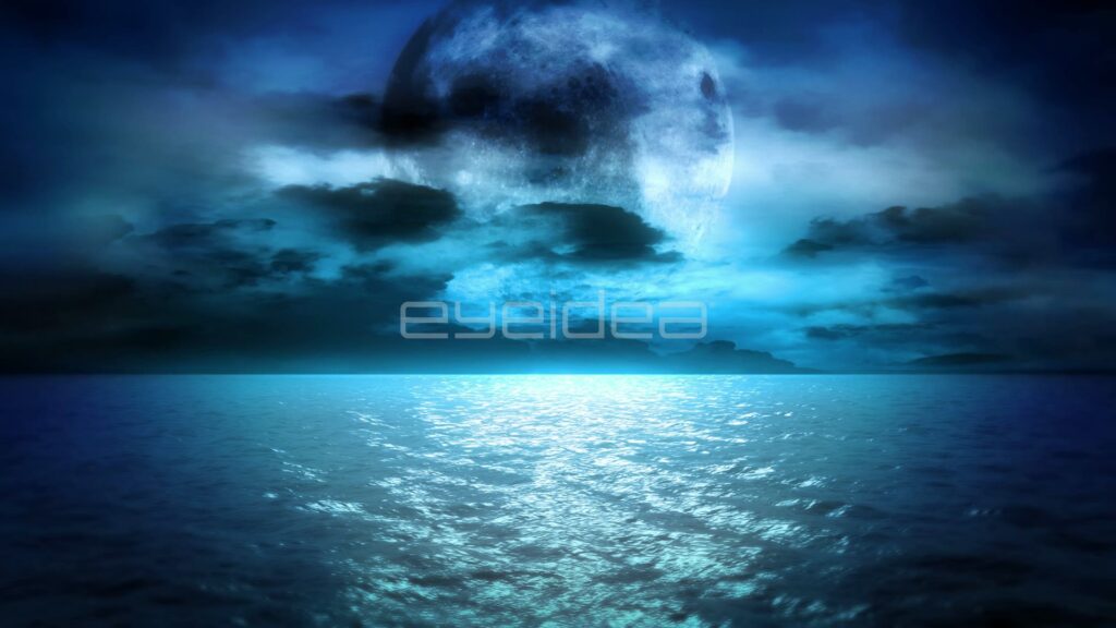 Giant Moon Rising Behind Clouds Over a Moonlit Sea