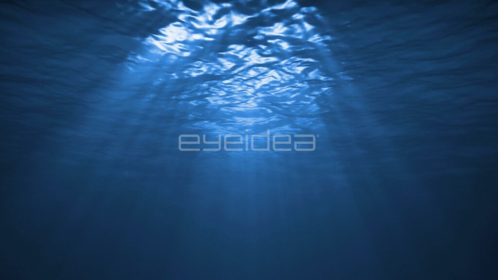 Shimmering Light Patch Above a Deep Blue Underwater Abyss