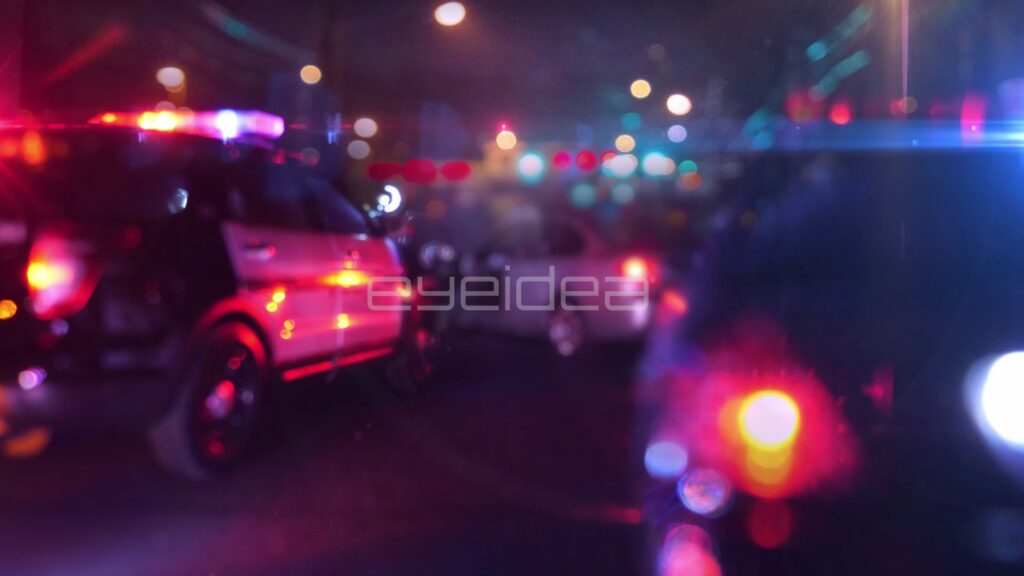 Police SUV Under Streetlights with Lens Flare Glare