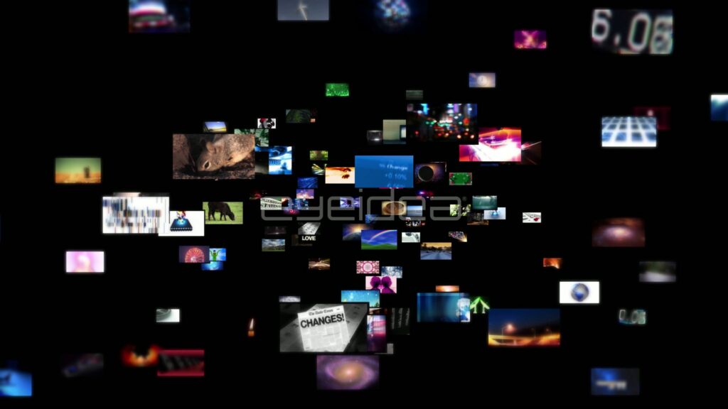 Multicolor Video Wall of Floating Digital Screens on Black Background