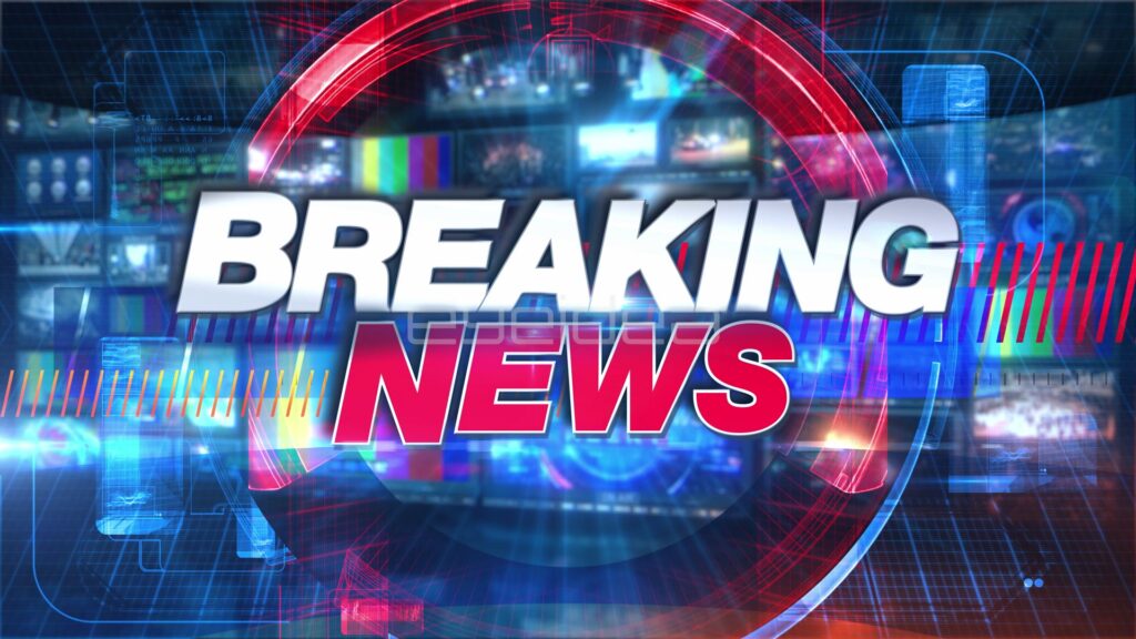 BREAKING NEWS Title with Red NEWS Lettering over a Monitor Wall