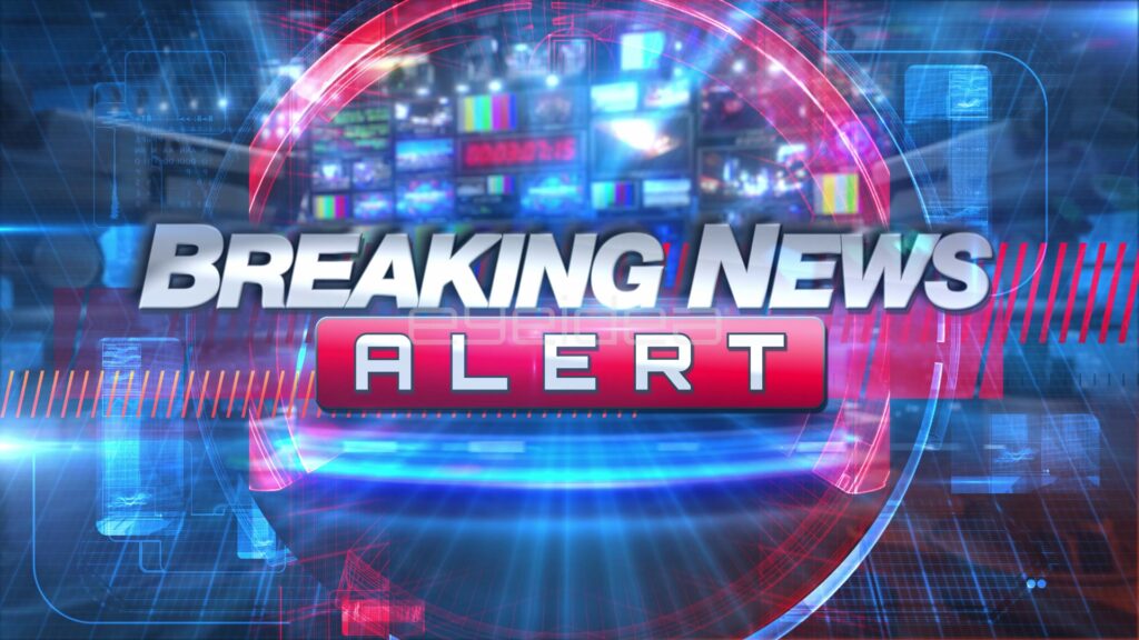 BREAKING NEWS ALERT Title in Front of a Studio Monitor Wall