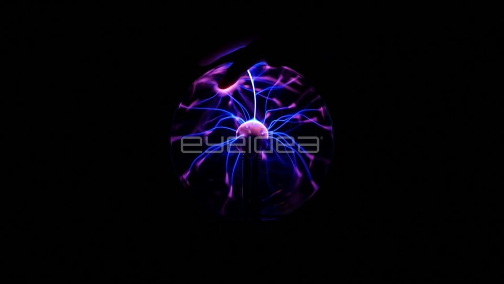 Small Off-Center Plasma Globe with a Fingertip Streamer on Black