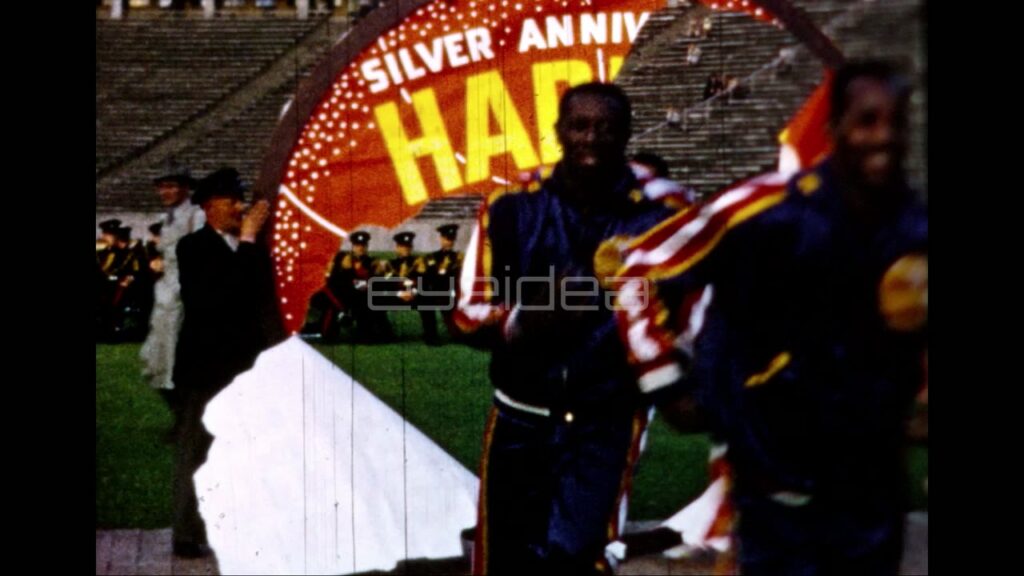 Harlem Globetrotters Player Entering Through Paper Hoop (Archival 1950s)