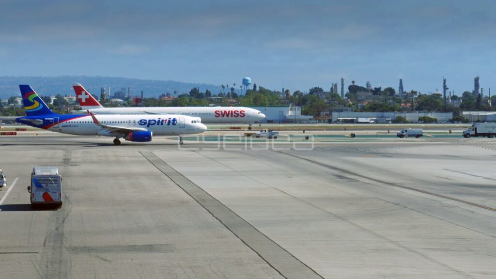 Jet Airliners Taxiing at LAX Airport Terminals