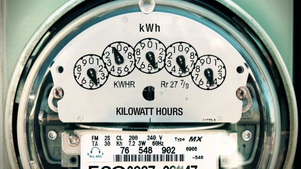 Close-Up of Spinning Electricity Meter Dials in Time-Lapse