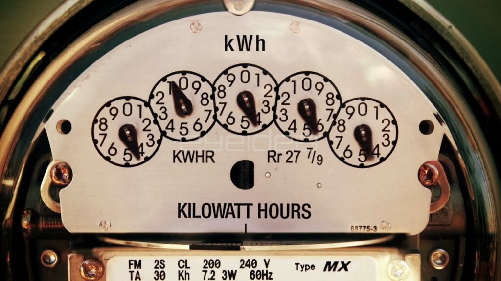 Close-Up Zoom of Spinning Electricity Meter Dials