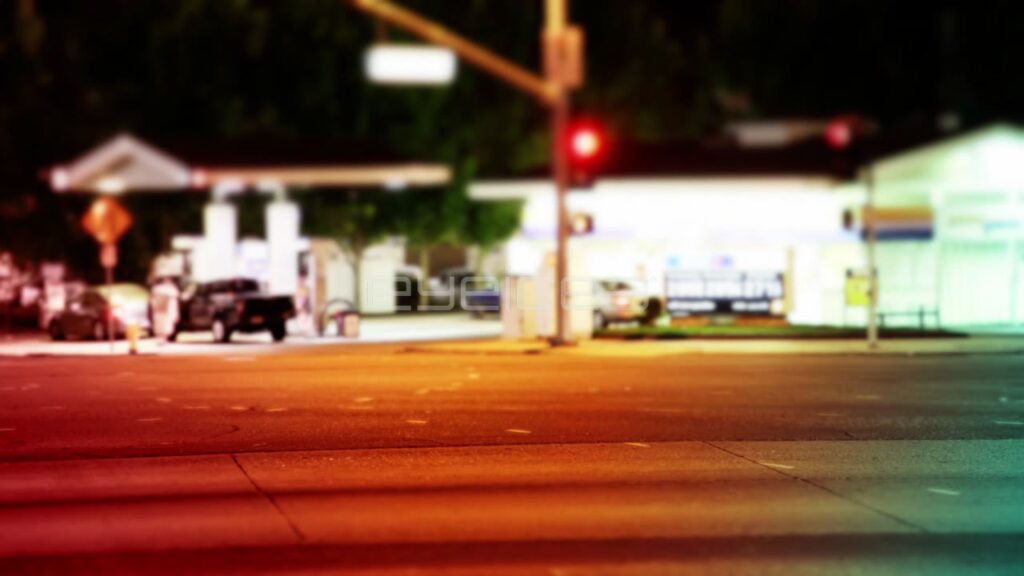 Time-Lapse of Night Traffic near Gas Station with Tilt-Shift Effect