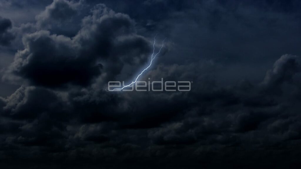 Lightning Bolt Striking through Dark Blue Storm Clouds