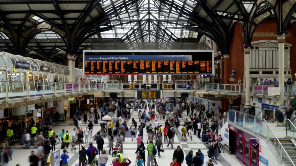 Time-Lapse of Commuters in High-Angle View of London Station