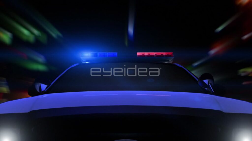 Low Angle View of Police Car with Flashing Lights