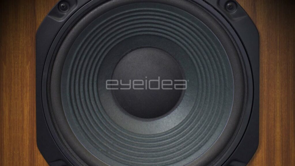 Vintage Black Speaker Vibrating against Wood Background