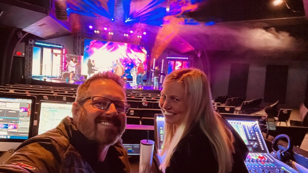 Chad J.W. Anderson with a colleague at the show console